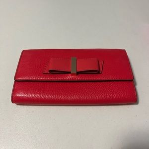 Red wallet from kate spade
